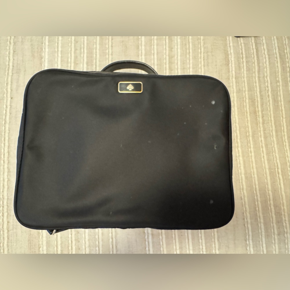 Kate Spade travel toiletries bag.